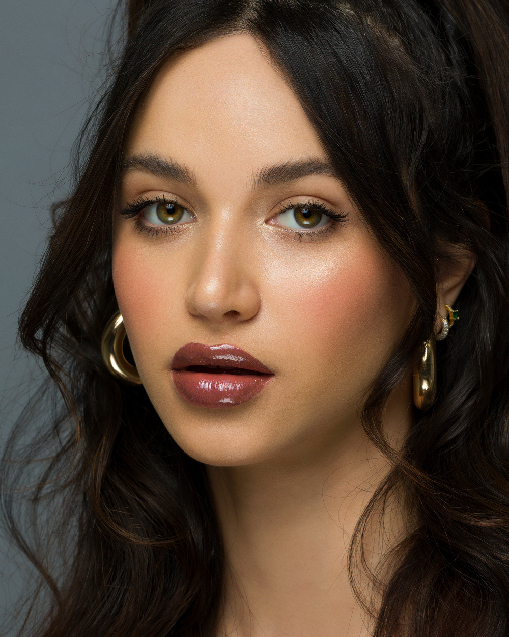 Woman wearing SOOO GOOD Lip Paint and Lip Gloss